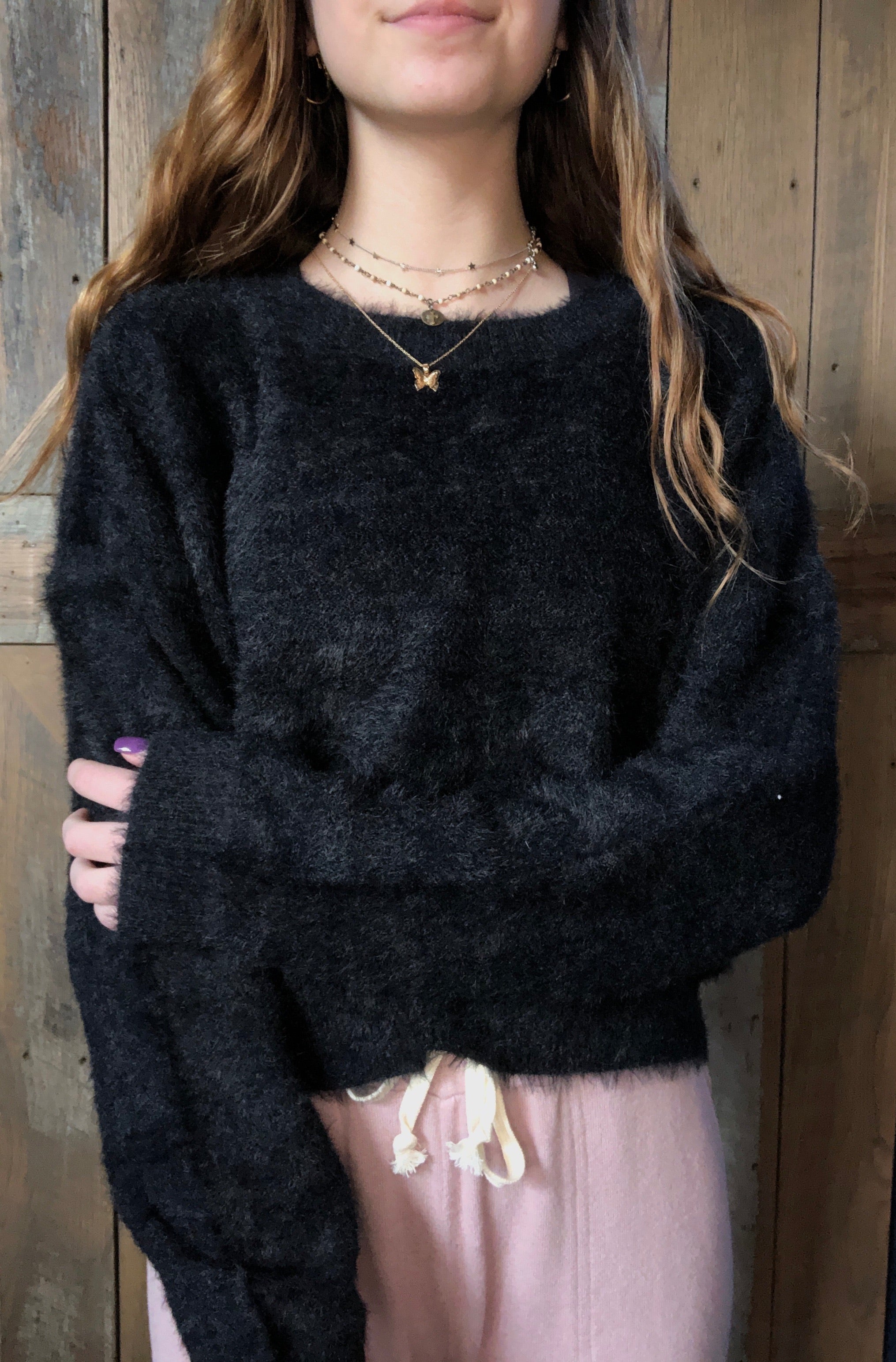 black fuzzy sweater